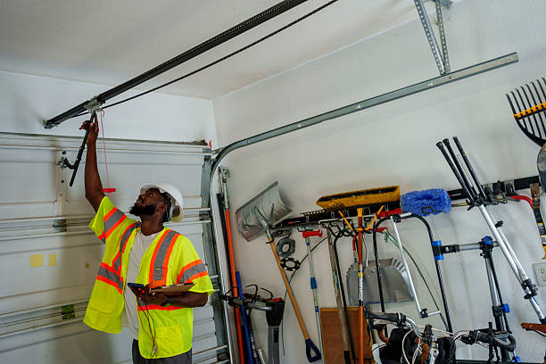 Professional Garage Door Installation technician working in South Lancaster, MA